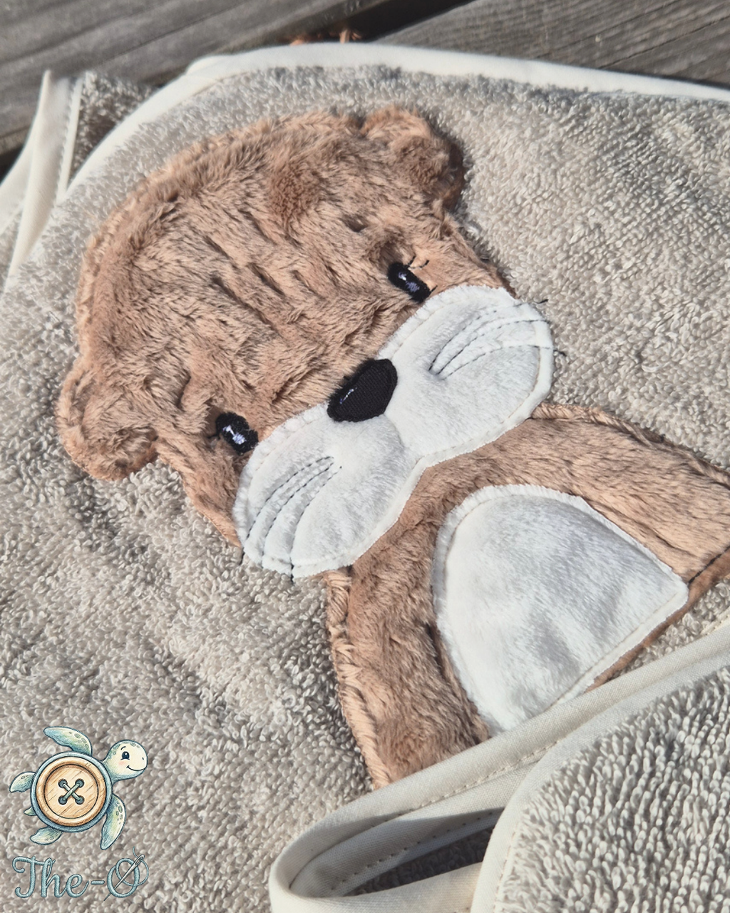 Kapuzenhandtuch Otter