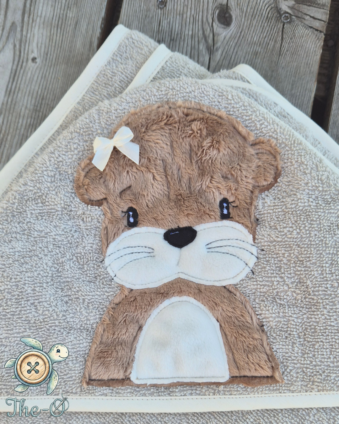 Kapuzenhandtuch Otter